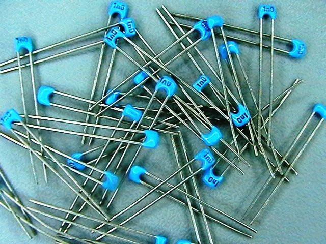 1nf/63V,  J,  ceramic capacitor CM